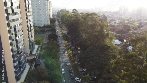 Aerial Shot Passing Over Residential Buildings, Street And Luxury Houses photo