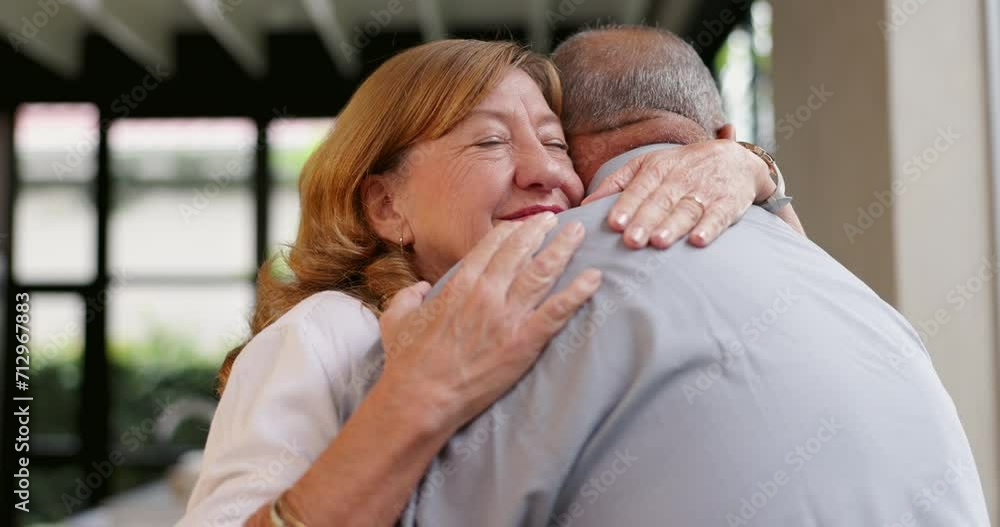 Hug, home and mature couple by window for bonding, happiness and loving relationship in morning. Retirement, marriage and senior man and woman embrace for love, commitment and support in house Hug, home and mature couple by window for bonding, happiness and loving relationship in morning. Retirement, marriage and senior man and woman embrace for love, commitment and support in house