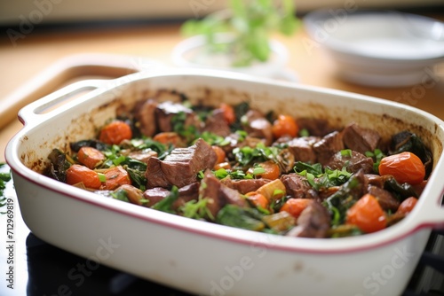 fresh out of the oven beef bourguignon in a casserole dish