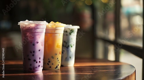 Bubble tea set in plastic glasses, variety of tapioca or boba tea in a row. photo