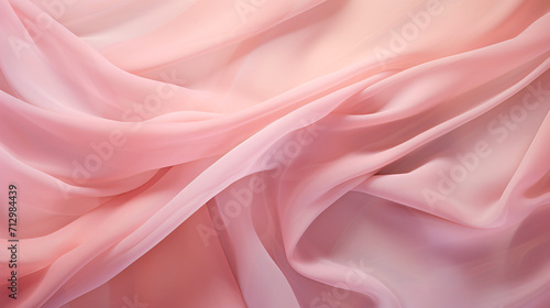 Tender pink silk softly draped on pink background