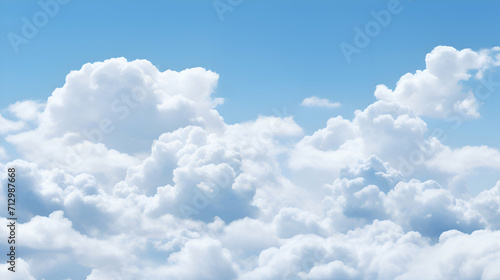 Daytime sky with white cumulus clouds photo