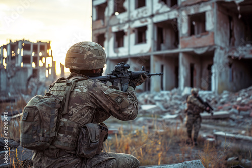 A soldier in camouflage with a machine gun stands among the ruins of a destroyed city.