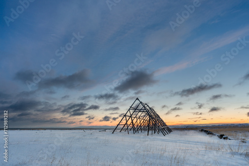 A fish drying rack on a beautiful but cold winter day during the polar night photo