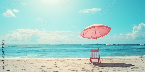 Little pink parasol and chair on the beach summer photo