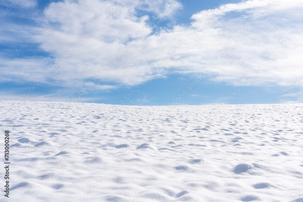 Abstract winter panorama with snowy ground and clear sky. Tuscany, Italy