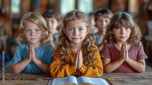 Children praying in a Christian school