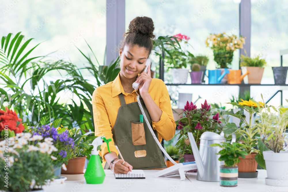Florist taking orders over the phone Florist taking orders over the phone