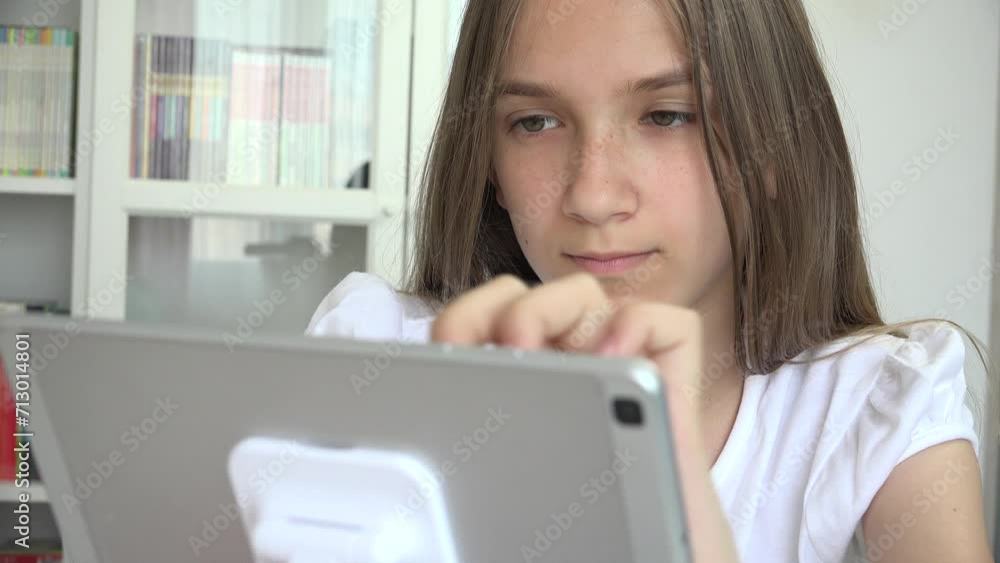 Adolescent Girl Tablet Browsing Internet, Kid Learning on Touchscreen Device, Child Studying for School, Playing Online Gaming Adolescent Girl Tablet Browsing Internet, Kid Learning on Touchscreen Device, Child Studying for School, Playing Online Gaming