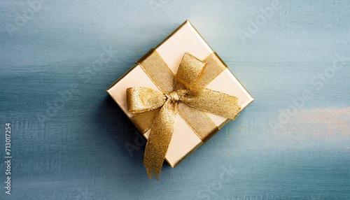 Heap of gift or present boxes and stars confetti on table top view. Flat lay festive composition for birthday or Christmas.