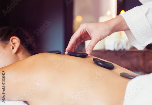 Hot stone massage therapy. Spa treatment