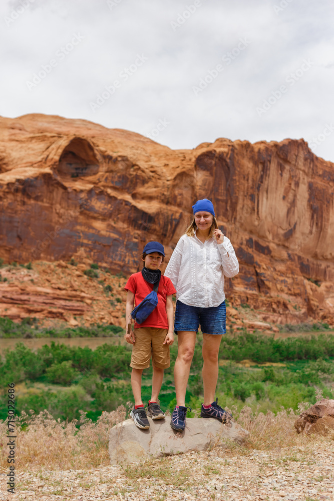 Mom and Son Standing among Rock Formations in Utah Mom and Son Standing among Rock Formations in Utah