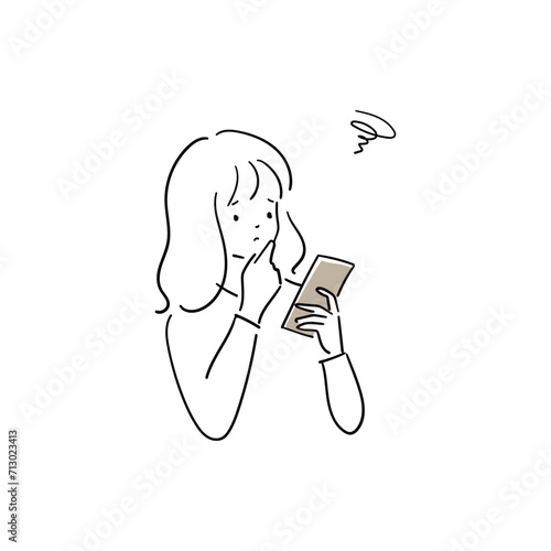 困った顔でスマートフォンを見る若い女性