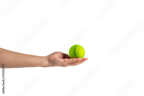 Tennis ball in hand on transparent background  © apinya