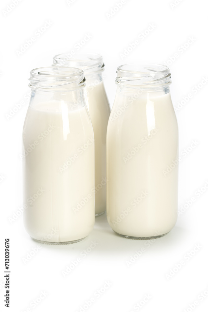 Bottles of milk on white background Bottles of milk on white background