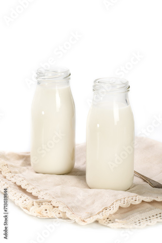 Bottles of milk on a napkin
