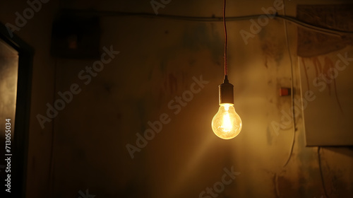 Electric lamp hanging on a wire in the room