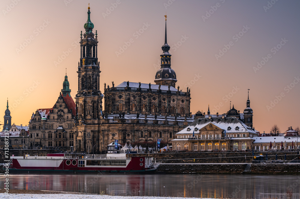 The Dresden Cathedral (Hofkirche) by the Elbe river in the winter morning dawn. 