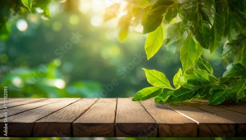 green leaves on wood.a wooden tabletop immersed in fresh sunlight  with a background of various leaves creating a natural green blur  conveying a sense of tranquility and natural beauty.