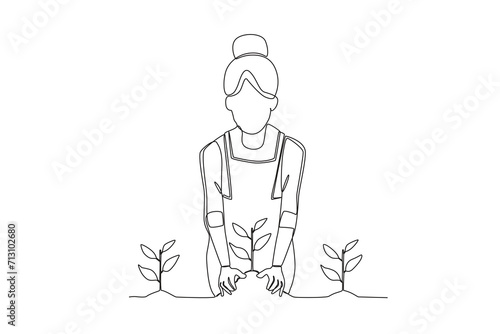 Single continuous line drawing of Woman planting plants. Minimalism metaphor concept. Dynamic one line draw graphic design vector illustration.
