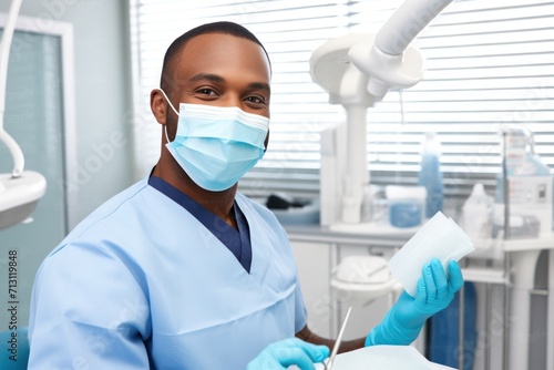A cheerful African dentist wearing a mask, specializing in dental care and oral health.