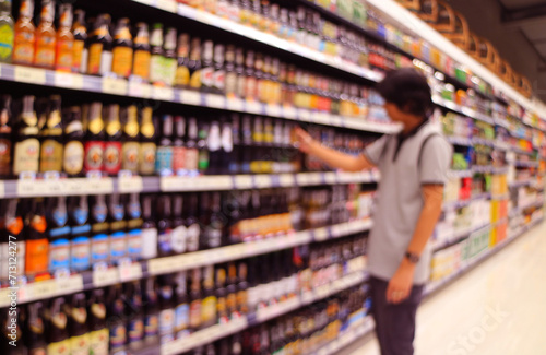 Abstract blurred people shopping liquor in a retail store