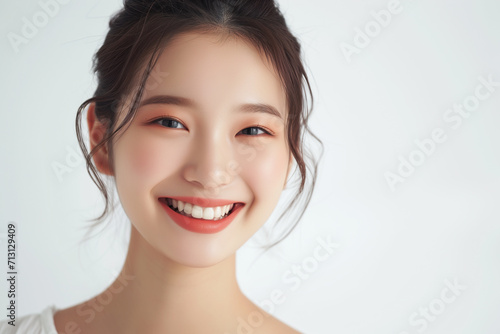 Beautiful young woman with perfect skin. Natural beauty, cosmetics, skin care concept. Copy space
