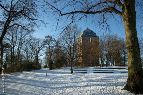 Hamburg in winter, Park around an ancient water tower in Sunny frosty day. High quality photo photo