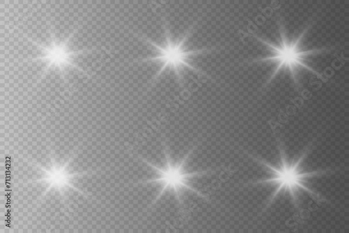 White glowing light. Glowing light effect with flash and glare rays. On a transparent background.