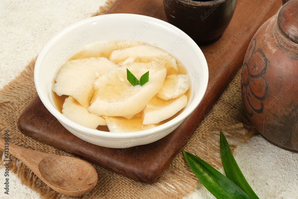 Douhua Tahwa,Taiwanese Dessert Soybean Soya Pudding with Ginger and Palm Sugar Syrup.as known as kembang tahu or wedang tahu in Indonesia Douhua Tahwa,Taiwanese Dessert Soybean Soya Pudding with Ginger and Palm Sugar Syrup.as known as kembang tahu or wedang tahu in Indonesia