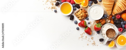 Top view of Healthy breakfast concept with fresh pancakes, berries, fruit on white backgroudt. Free space for your text.