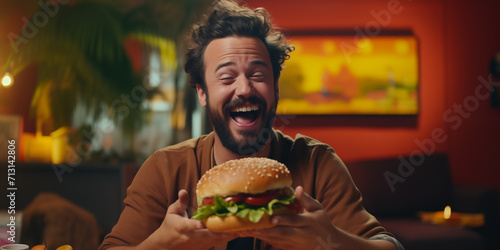 happy man eating hamburger