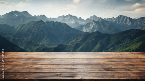 Wooden table mountains bokeh background, empty wood desk surface product display mockup with blurry nature hills landscape abstract travel backdrop advertising presentation. Mock up, copy space. © Synthetica