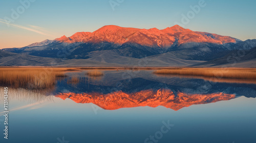 Alpenglow Reflection on Serene Mountain Lake