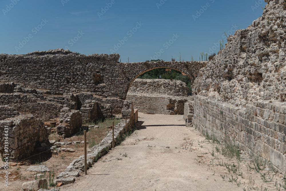 Image of the Roman ruins in Conimbriga, Portugal. Historical elements found at the site in archaeological work. Roman aqueduct, ruins of the ancient city.