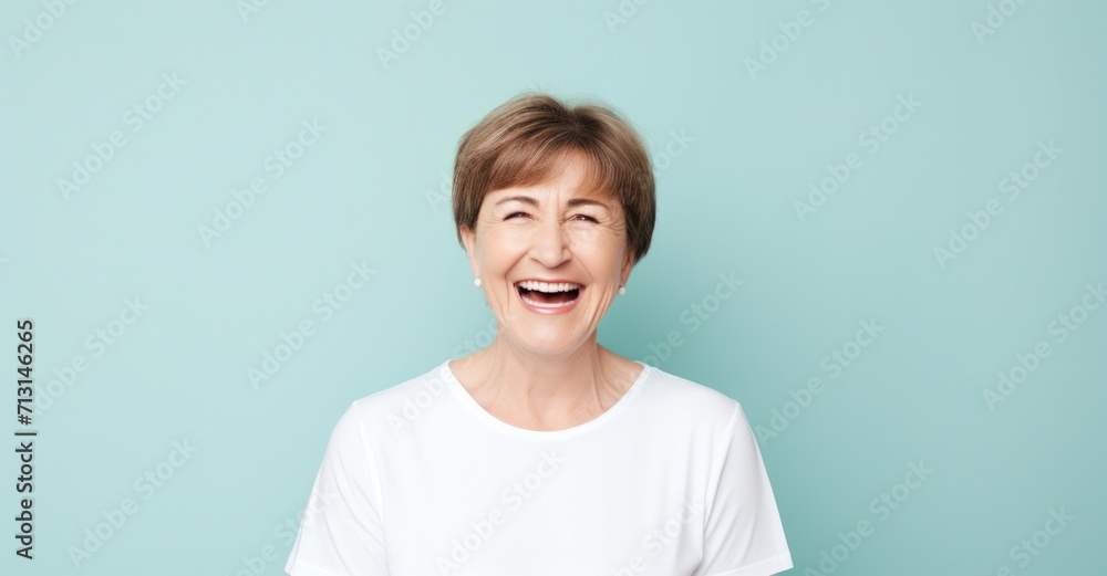 Joyful middle-aged woman radiating beauty with healthy skin and a bright smile Joyful middle-aged woman radiating beauty with healthy skin and a bright smile