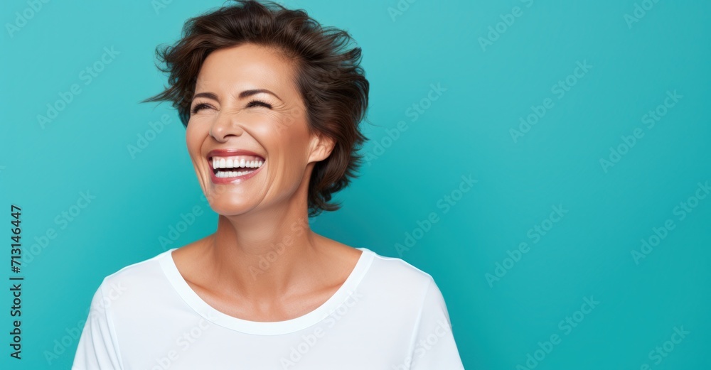 Joyful middle-aged woman radiating beauty with healthy skin and a bright smile Joyful middle-aged woman radiating beauty with healthy skin and a bright smile