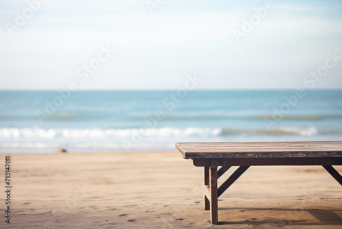 Wooden table ocean bokeh background  empty wood desk surface product display mockup with blurry sea water sunny beach abstract summer travel backdrop advertising presentation. Mock up  copy space.