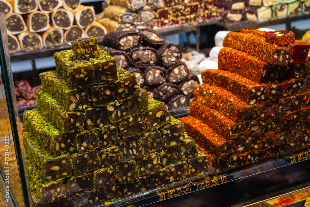 Traditional Turkish delight on the counter in close-up. Delicious, varied Turkish sweets Traditional Turkish delight on the counter in close-up. Delicious, varied Turkish sweets