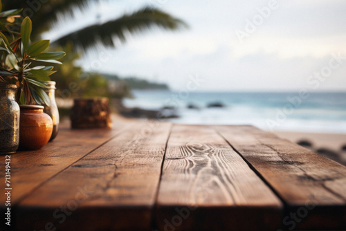 Wooden table ocean bokeh background, empty wood desk surface product display mockup with blurry sea water sunny beach abstract summer travel backdrop advertising presentation. Mock up, copy space. © Synthetica