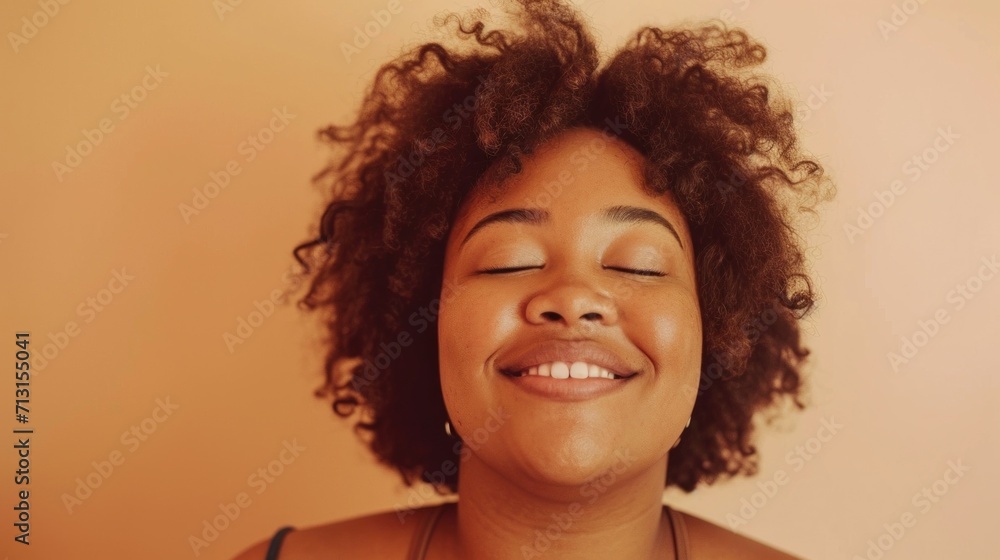A radiant plus-size woman beams joy in a studio portrait. A radiant plus-size woman beams joy in a studio portrait.