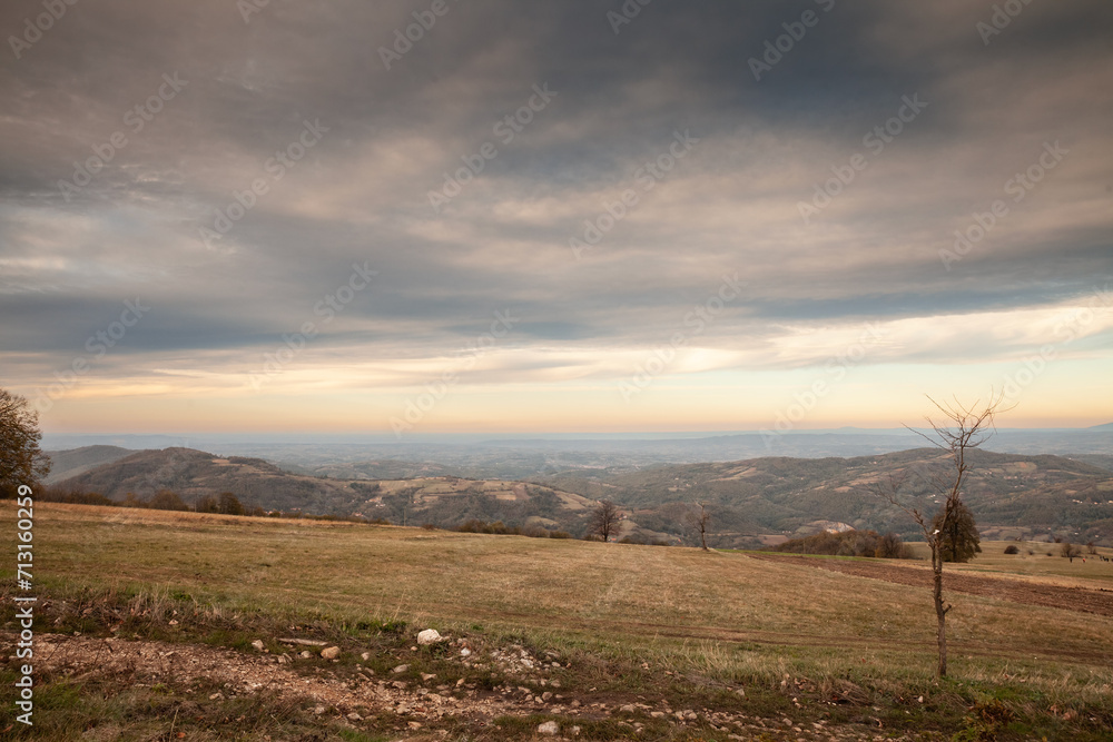 Panorama of the top and summit of Vrh Rajac moutain at dusk in autumn. Rajac is a mountain of Sumadija in Serbia, part of the dinaric alps, a major serbian natural touristic destination. Panorama of the top and summit of Vrh Rajac moutain at dusk in autumn. Rajac is a mountain of Sumadija in Serbia, part of the dinaric alps, a major serbian natural touristic destination.