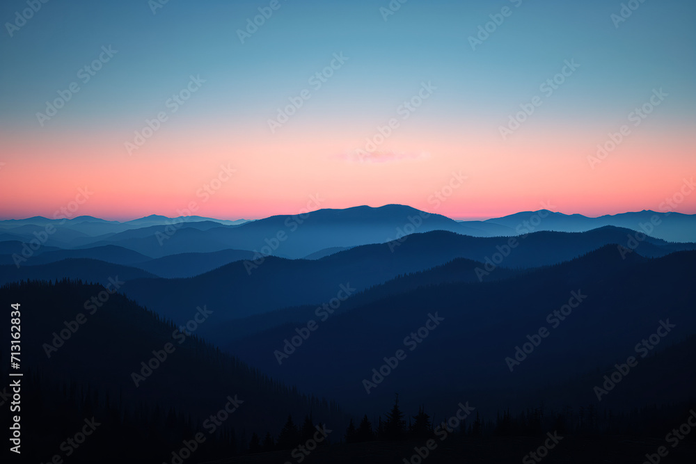 Soft Sunset Over Layered Mountain Ridges