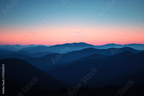 Soft Sunset Over Layered Mountain Ridges