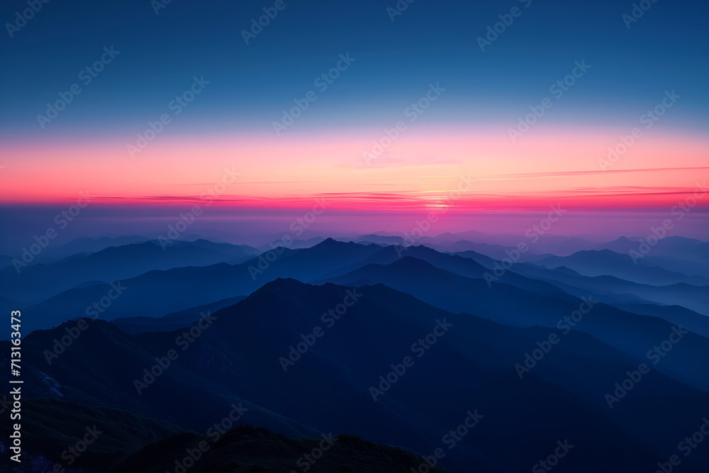 Serene Sunset Overlapping Mountain Ridges