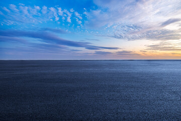New asphalt road and sky clouds background
