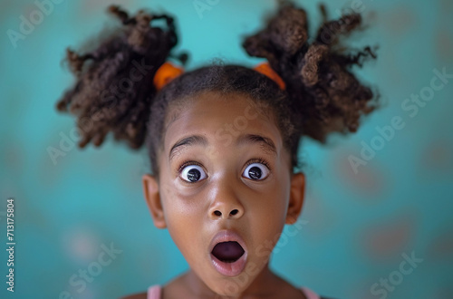 African American girl with surprised face close-up © imagineRbc