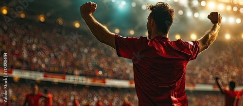 Football World Championship Soccer Player Runs to Kick the Ball Ball on the Grass Field of Arena Full Stadium Crowd Cheers International Tournament Cinematic Shot Captures Victory. Copy space image photo