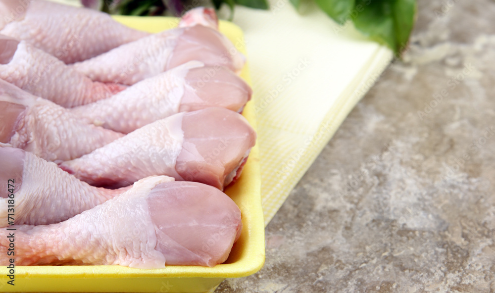raw chicken meat with herbs and spices raw chicken meat with herbs and spices
