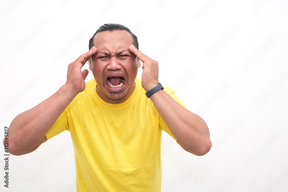 asian man headache expression portrait isolated white background asian man headache expression portrait isolated white background